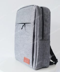 Tas ransel bahan toscano promosi plus logo min 1 lusin